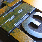 ‘Season’s Greeting’s’ wood type card